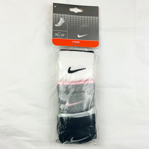 3 Per Pack Y2k Women's Deadstock Vintage Nike Sports Socks in White, Grey and Black. Socks has 3 different coloured Nike Swoosh. Black swoosh, Pink swoosh and white swoosh Colour: White, Grey & Black Brand New with Tags - Size on Tag: 5 - 8 All our items are of vintage conditions. This means some items may show signs of minor wear. Any major defects will be pictured and stated in the description