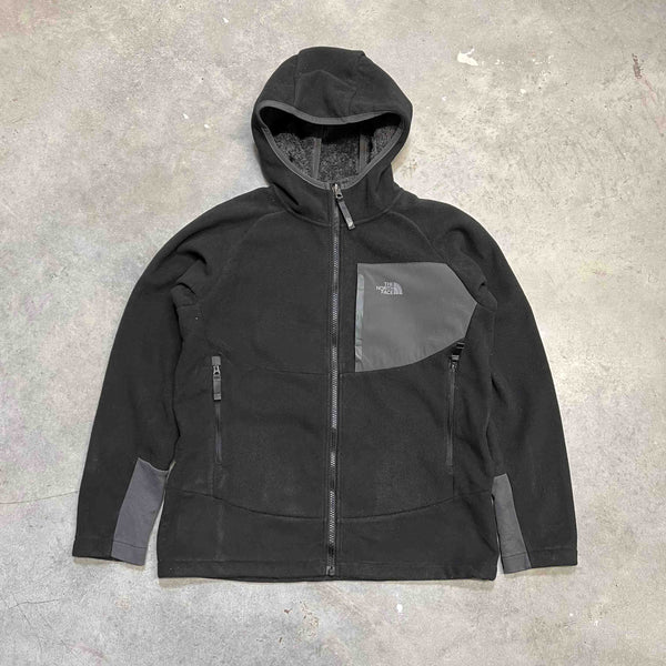 The North Face fleece in black. Size on tag: Boys Large  (fits adult xs)  Measurements:  Pit to Pit: 20 inches  Length: 24.5 inches