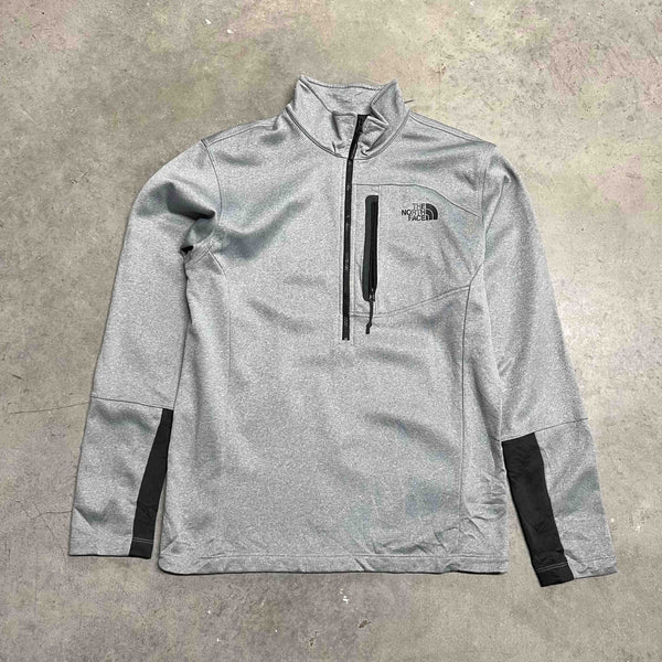 Vintage The North Face sweatshirt in grey with 1/2 zip closure. Size on tag: Medium  Measurements:  Pit to Pit: 20 inches  Length: 27 inches