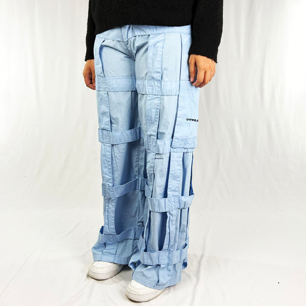 ﻿Deadstock Vintage Criminal Damage Lattice Cargo Trousers in baby blue with Criminal Damage branding. High-waisted trousers. Pockets to sides. Belt loops for belt adjustment.  Material: Polyester/Cotton Condition: Brand new with tags Measurements: