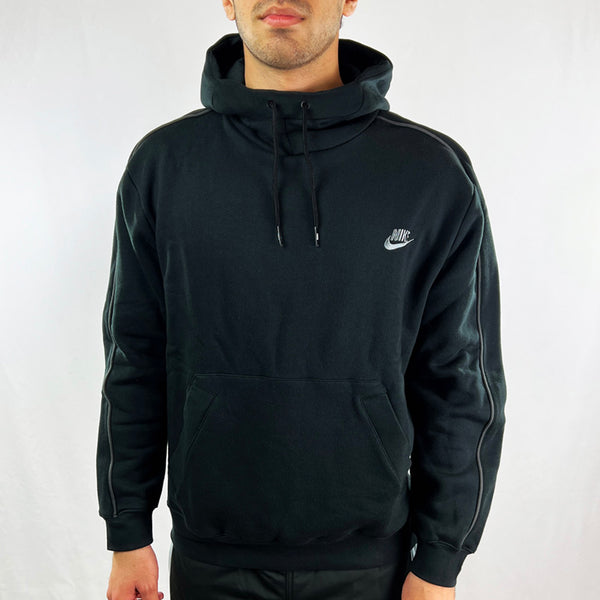 Y2K Deadstock Vintage Nike Spellout hoodie in black. Embroidered Nike spellout logo to chest. Kangaroo pocket to front. Hood with adjustable drawstrings. Comfortable and cosy. - Materials: 77% Cotton - 23% Polyester - Colour: Black Brand New with Tags
