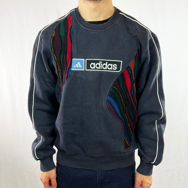 Vintage reworked Adidas x COOGI Sweatshirt in navy blue with spellout logo to chest. Crewneck. - Colour: Navy Blue Condition: Good  - Size on Tag: Medium Measurements: Pit to Pit: 23.5 Inches Length: 26.5 Inches