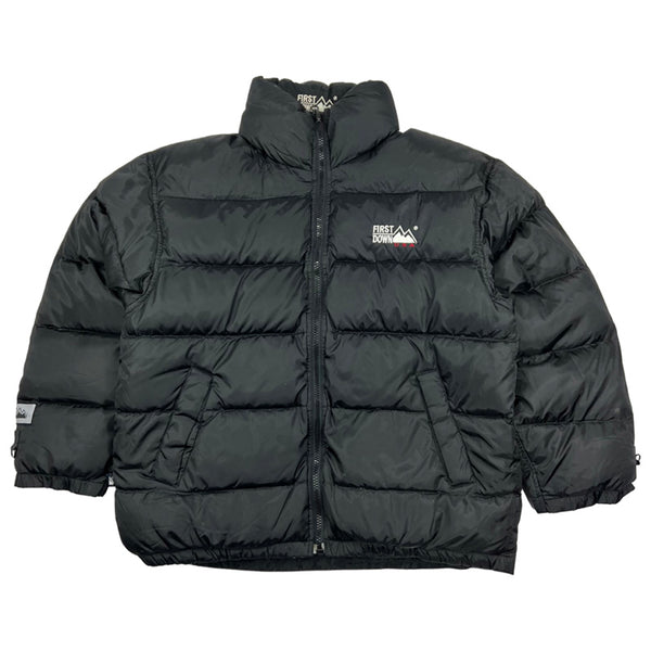 Y2K Vintage First Down reversible puffer jacket in black. First Down reflective branding. Pockets to front. Zip closure to jacket. Down filled. - Colour: Black Condition: Very Good - Size on Tag: Medium Measurements: Pit to Pit: 26 Inches Length: 29.5 Inches