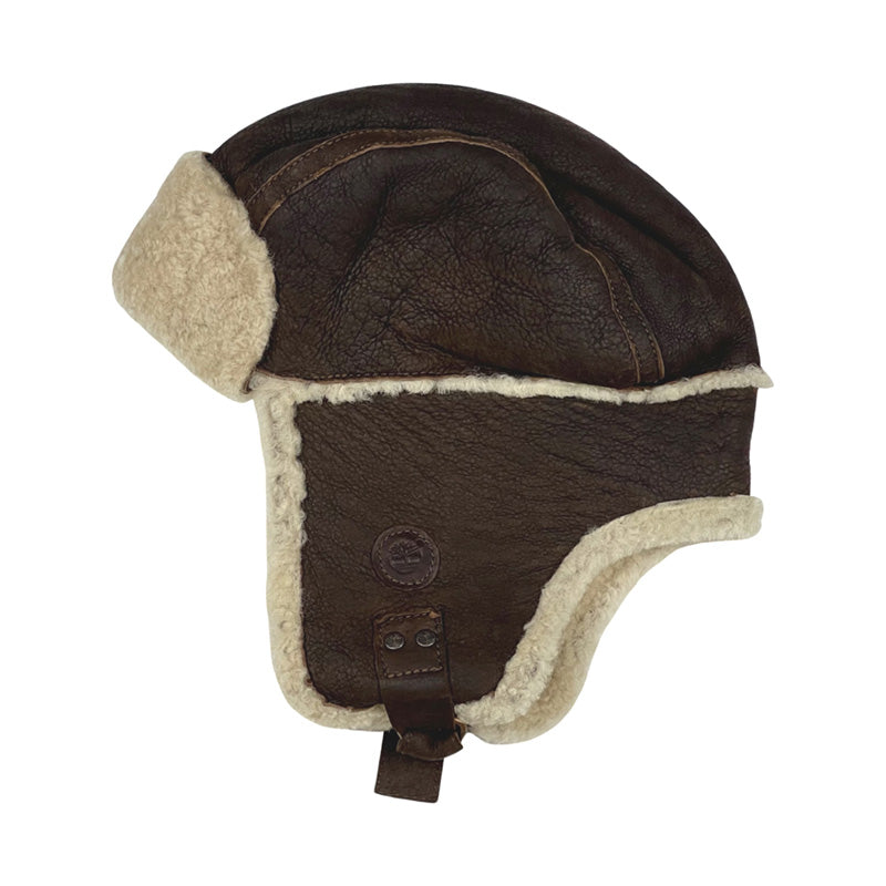 Deadstock Timberland lamb leather shearling trapper hat in brown with Timberland logo to side. Colour: Brown Brand New with Tags  -  Size on Tag: One Size