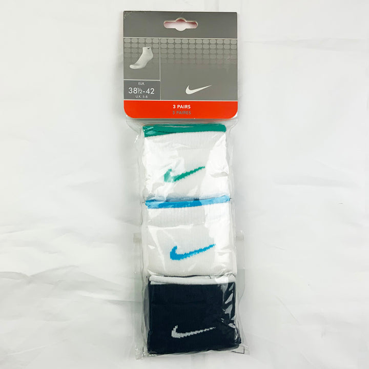3 Per Pack Y2k Women's Deadstock Vintage Nike Sports Socks in White and Black. Socks has 3 different coloured Nike Swoosh. Green swoosh, blue swoosh and white swoosh Colour: White & Black  Brand New with Tags -  Size on Tag: 5 - 8  All our items are of vintage conditions. This means some items may show signs of minor wear. Any major defects will be pictured and stated in the description