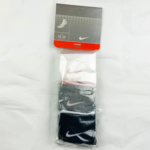 3 Per Pack Y2k Women's Deadstock Vintage Nike Sports Socks in White, Grey and Black. Socks has 3 different coloured Nike Swoosh. Pink swoosh, pink swoosh and white swoosh Colour: White, Grey & Black  Brand New with Tags -  Size on Tag: 2.5 - 5  All our items are of vintage conditions. This means some items may show signs of minor wear. Any major defects will be pictured and stated in the description
