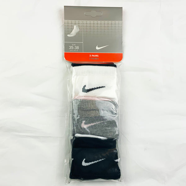 3 Per Pack Y2k Women's Deadstock Vintage Nike Sports Socks in White, Grey and Black. Socks has 3 different coloured Nike Swoosh. Black swoosh, pink swoosh and white swoosh Colour: White, Grey & Black  Brand New with Tags -  Size on Tag: 2.5 - 5  All our items are of vintage conditions. This means some items may show signs of minor wear. Any major defects will be pictured and stated in the description
