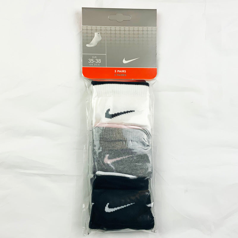 3 Per Pack Y2k Women's Deadstock Vintage Nike Sports Socks in White, Grey and Black. Socks has 3 different coloured Nike Swoosh. Black swoosh, pink swoosh and white swoosh Colour: White, Grey & Black  Brand New with Tags -  Size on Tag: 2.5 - 5  All our items are of vintage conditions. This means some items may show signs of minor wear. Any major defects will be pictured and stated in the description