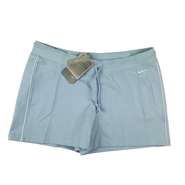 2006 Women's Deadstock Vintage Nike low waist shorts in light blue with Nike swoosh. Adjustable drawstring to waist. Colour: Light Blue  Brand New with Tags  -  Size on Tag: Large  Measurements:  Length: 12.5 Inches  Waist: GB 14/16  All our items are of vintage conditions. This means some items may show signs of minor wear. Any major defects will be pictured and stated in the description