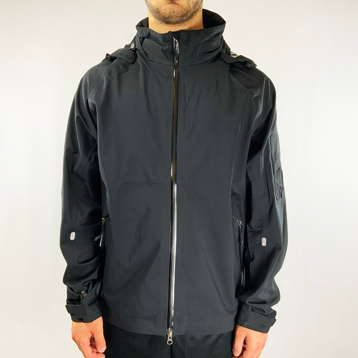 2008 Deadstock Vintage Nike Storm Fit Jacket in black. Storm-Fit technology. Zip ockets on side and pocket to arm. Hooded with adjustable cords. Reflective feature across arm.