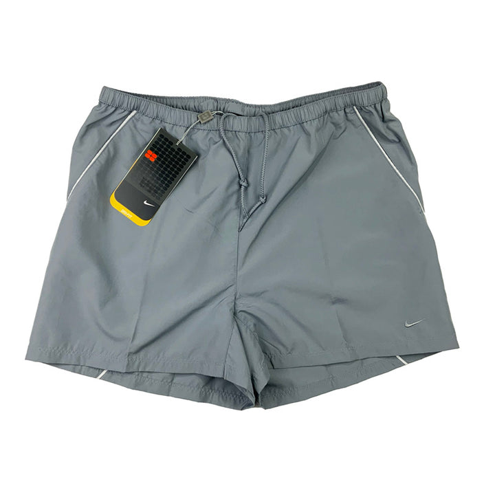 2004 Women's Deadstock Vintage Nike Court shorts in grey with Nike swoosh and Nike court branding. Adjustable drawstring to waist. Pockets to side. Polyester material. Colour: Grey Brand New with Tags  -  Size on Tag: Small Measurements:  Length: 13.5 Inches  Waist: GB 8/10  All our items are of vintage conditions. This means some items may show signs of minor wear. Any major defects will be pictured and stated in the description