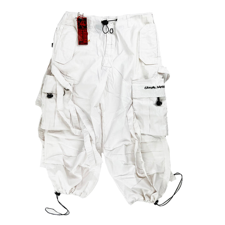 Y2K Women's Deadstock Vintage Criminal Damage Drome cargo shorts in white with Criminal Damage branding. Lattice style parachute cargos. Adjustable drawstring to waist. Pockets to side. Adjustable cord to hem. Material: Polyester/Cotton Colour: White Brand New with Tags
