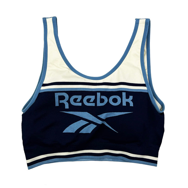 Y2k Women's Deadstock Vintage Reebok Spellout Crop Top in Blue with large Reebok Spellout to chest. Materials: Polyester/Polyamide/Elastane  Colour: Blue Brand New with Tags