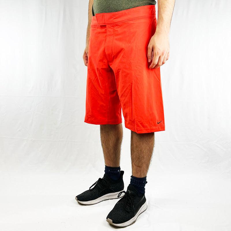 2002 NIKE SWOOSH SWIM SHORTS IN ORANGEY RED