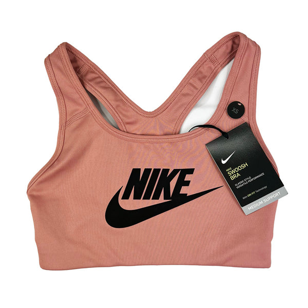 Women's Deadstock Vintage Nike Dri-Fit Swoosh sports bra in pink with Nike spellout to chest. Dri-Fit technology. Medium support. perfect for working out Materials: Polyester/Elastane Colour: Pink
