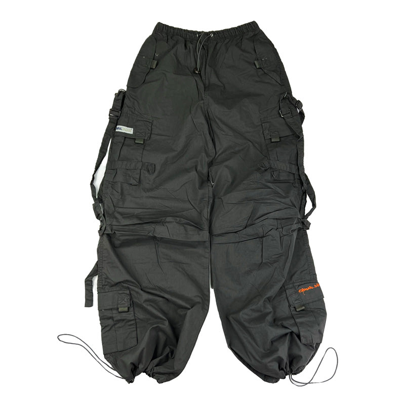 Super cute ﻿Deadstock Vintage Criminal Damage parachute cargo trousers in dark grey with Criminal Damage embroidered logo. Cord to waist. Plenty of pockets to sides and back. Lattice carnaby style. Adjustable cord to hem. Due to age you may need to tie the pull cord to keep in place Material: Polyester/Cotton Condition: Brand new with tags Measurements:  - Size on Tag: Medium Length: 44 Inches Inseam: 32 Inches
