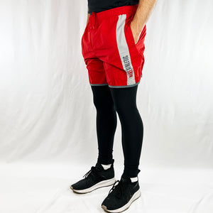 Super cool 90s Boys Deadstock Vintage Nike Athletic Spellout shorts in red. Nike Athletic branding. Pockets to sides. Drawstring to adjust waist. Retro style. Perfect for summer and swimming. Material: Nylon/Polyester Colour: Red Brand New with Tags - Size on Tag: Boys XL (Fits adult small) Measurements: Length: 15 Inches Wasit: 26-32 Inches