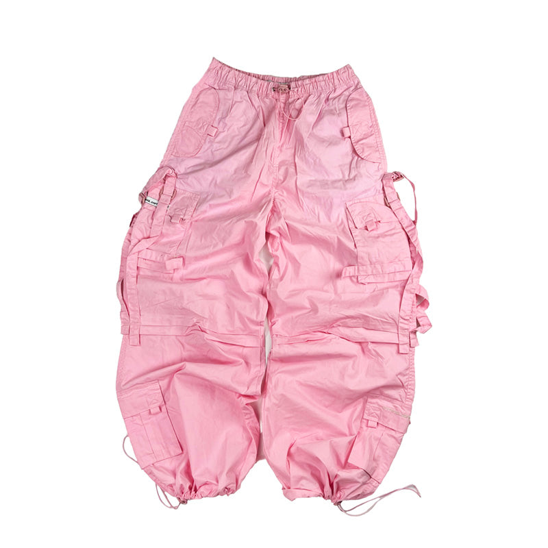 Super cute Deadstock Vintage Criminal Damage parachute cargo trousers in pink with Criminal Damage embroidered logo. Cord to waist. Plenty of pockets to sides and back. Lattice carnaby style. Adjustable cord to hem. Due to age you may need to tie the pull cord to keep in place Material: Polyester/Cotton Condition: Brand new with tags