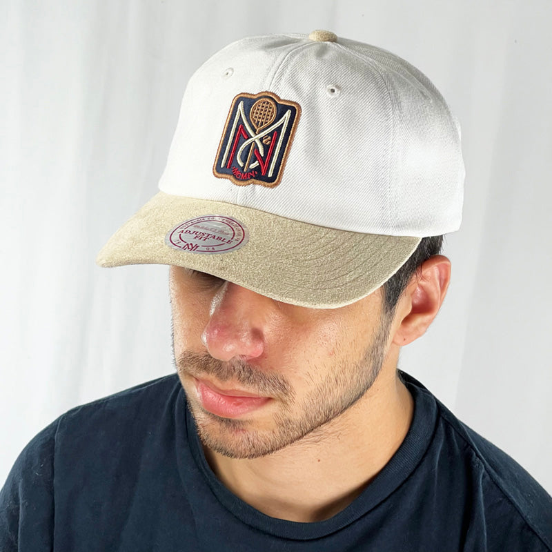Look stylish with this low profile Mitchell & Ness tennis strapback cap. Finished in white and paired with a cream flat visor, the fitted crow features a tennis logo and fully fitted for your complete comfort in a range of sizes. Mitchell & Ness embroidery to rear. Very slight mark on edge of visor as seen in image Colour: White Brand New with Tags - Size on Tag: One Size