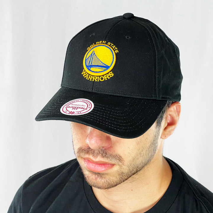 Support the NBA Golden State Warriors basketball team with this low profile snapback cap. Finished in black and paired with a curved visor, the fitted crow features the iconic Golden State Warriors logo fully fitted for your complete comfort in a range of sizes. Mitchell & Ness embroidery to rear Colour: Black Brand New with Tags - Size on Tag: One Size