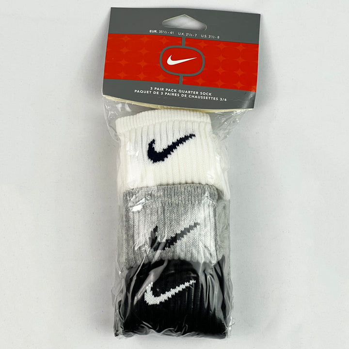 3 Pair Pack Y2k Deadstock Vintage Nike Quarter Socks. White pair with black swoosh. Grey pair with white swoosh. Black pair with white swoosh. Perfect for your casual loungewear or training. Colour: Multicoloured Brand New with Tags - Size on Tag: UK 2.5 - 7
