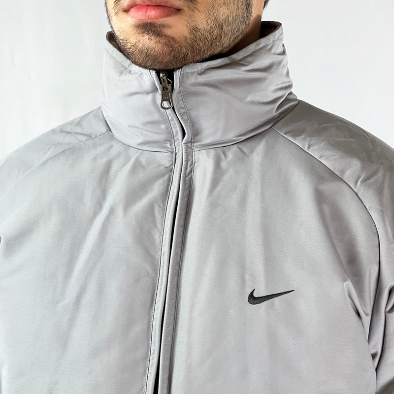 Vintage Nike Sporting Excellence Puffer Jacket in Grey