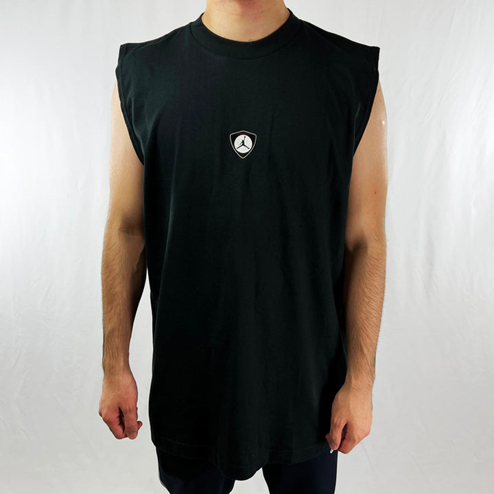 90s Deadstock Vintage Jordan Vest Top in black with Air Jordan logo to chest and Michael Jordan's iconic number 23 to back. Material: Cotton Colour: Black Brand New with Tags