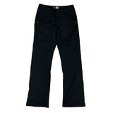 2007 Women's Deadstock Vintage Nike ACG Cargo Trousers in Black. Nike ACG branding. Thermore technology fleeced inner layer. Button closure to waist. Pockets to front and back. Low rise fit. - Materials: Polyester - Colour: Black Brand New with Tags