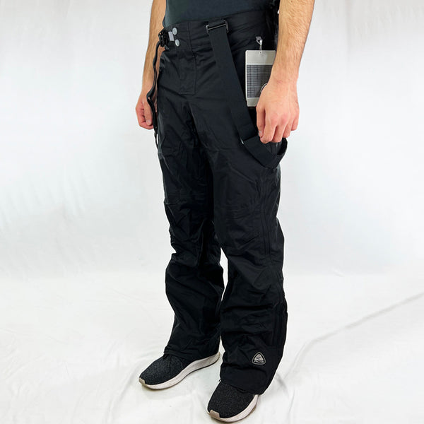 Y2K Women's Deadstock Vintage Nike ACG Cargo Ski Pants in black with removeable suspenders. Nike ACG branding. Storm-Fit technology. Fleeced inner layer. Zip pockets to sides. Boot gaiters. Belt loops for belt adjustment. - Materials: Nylon - Colour: Black Brand New with Tags