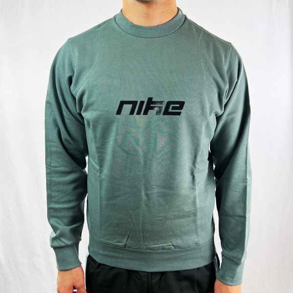 Y2K Deadstock Vintage Nike Spellout sweatshirt in green. Nike spellout across chest. Swoosh logo to sleeve. Crew neck. - Materials: 80% Cotton - 20% Polyester - Colour: Green Brand New with Tags - Size on Tag: XS Measurements: Pit to Pit: 21 Inches Length: 25 Inches