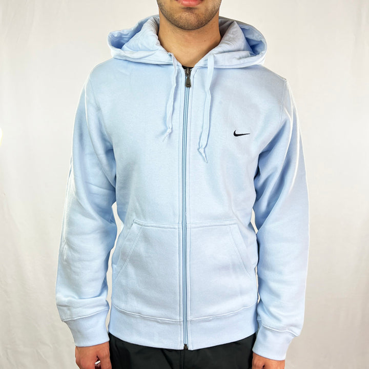 Y2K Deadstock Vintage Nike Swoosh hoodie in baby blue. Nike swoosh logo to chest  Pockets to front. Hood with adjustable drawstrings. Full zip closure. Comfortable and cosy. - Materials: 80% Cotton - 20% Polyester - Colour: Baby Blue Brand New with Tags - Size on Tag: Small Measurements: Pit to Pit: 21 Inches Length: 26 Inches - Size on Tag: Large Measurements: Pit to Pit: 25 Inches Length: 28 Inches