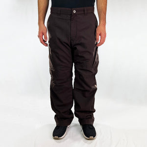 Y2K Deadstock Vintage Nike ACG cargo trousers in brown with Nike ACG branding. Thermore light insulation fleeced inner layer. Zip pockets. Belt loops for waist adjustment. - Materials: Polyester - Colour: Brown Brand New with Tags