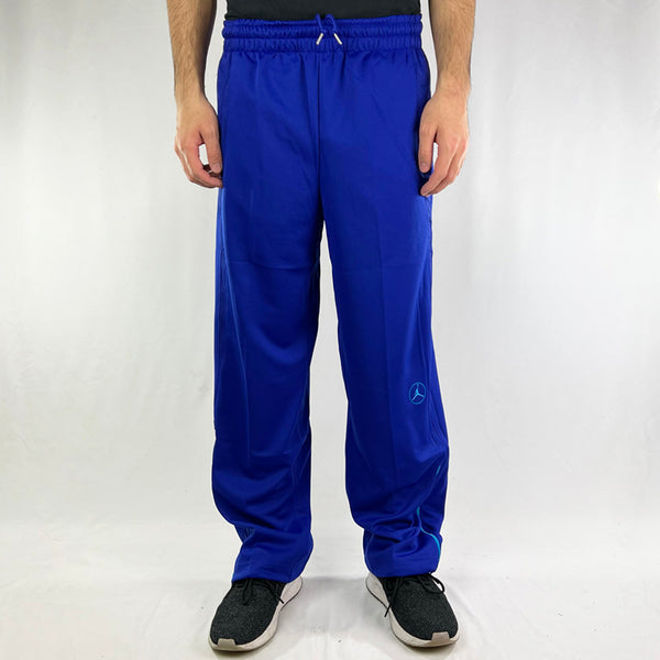 Y2K Deadstock Vintage Jordan joggers in blue. Jump man logo to both sides. Pockets to sides. Dri-Fit technology. Adjustable drawstrings to waist. - Materials: Polyester - Colour: Blue Brand New with Tags
