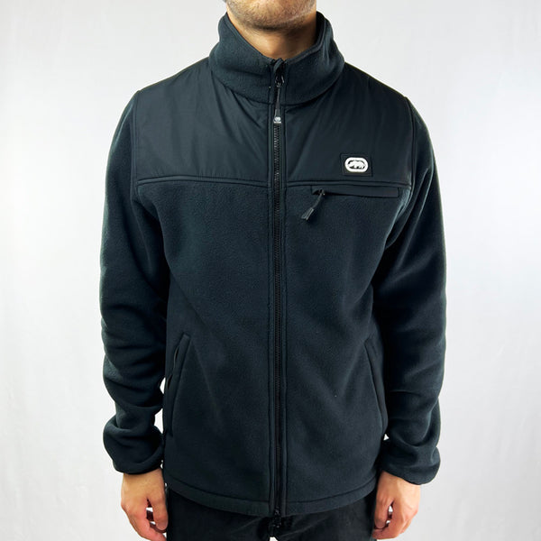 Ecko Unltd fleece jacket in black with Ecko Unltd logo to chest. Continuous two-way zip with chin guard. Stand-up collar. A breast pocket with zipper. Two side pockets with zipper. Elastic cuffs. Warm, soft fleece material. - Materials: 100% Polyester