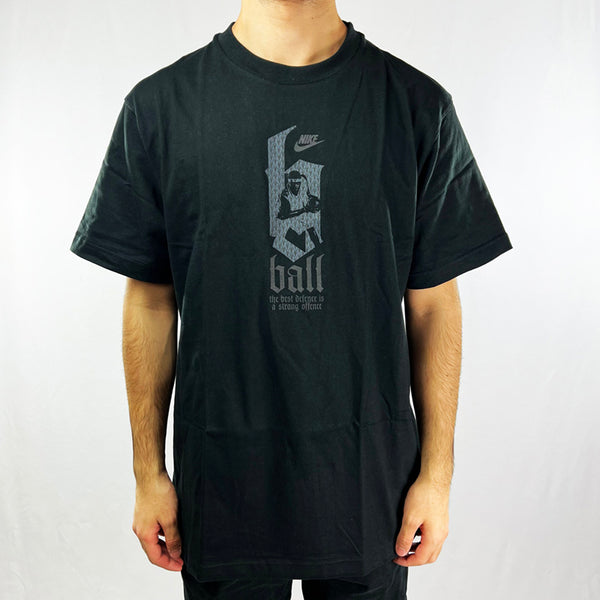 Y2K Deadstock Vintage Nike basketball t-shirt in black. Spellout 'the best defence is a strong offence' and Nike logo across chest with basketball player. Crew neck t-shirt. Material: Cotton Colour: Black Brand New with Tags