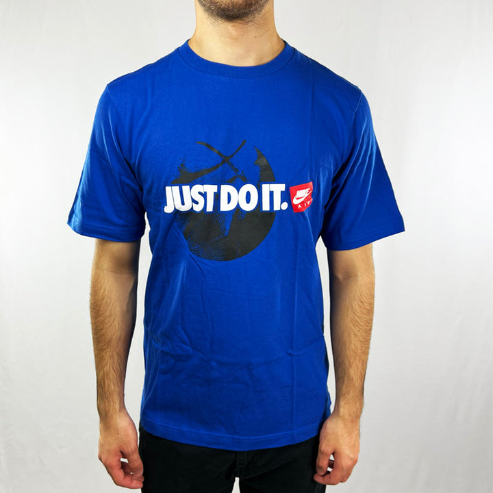 Y2K Deadstock Vintage Nike Just Do It t-shirt in blue. Spellout 'JUST DO IT' and Nike logo across chest with basketball image. Crew neck t-shirt. Material: 100% Organic Cotton Colour: Blue Brand New with Tags