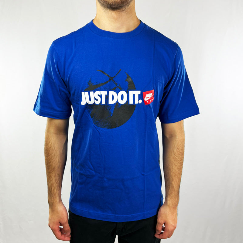 Y2K Deadstock Vintage Nike Just Do It t-shirt in blue. Spellout 'JUST DO IT' and Nike logo across chest with basketball image. Crew neck t-shirt. Material: 100% Organic Cotton Colour: Blue Brand New with Tags