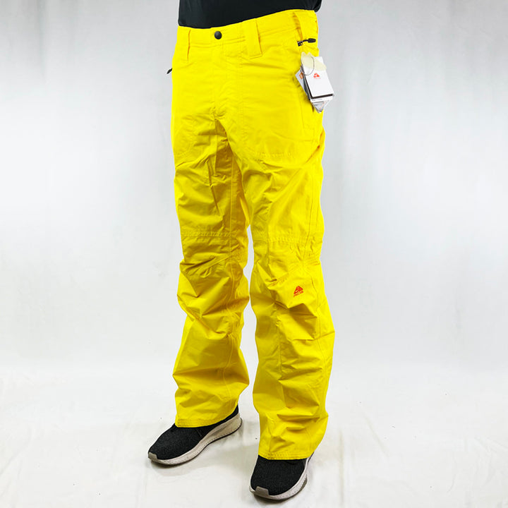 Y2K Women's Deadstock Vintage Nike ACG Cargo Ski Pants in yellow with Nike ACG branding. Storm-Fit technology. Thermore technology light insulation fleeced inner layer. Zip pockets. Boot gaiters. Belt loops for belt adjustment. - Materials: Polyester - Colour: Yellow Brand New with Tags