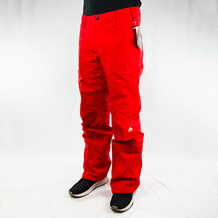 Y2K Women's Deadstock Vintage Nike ACG Cargo Ski Pants in red with Nike ACG branding. Storm-Fit technology. Thermore technology light insulation fleeced inner layer. Zip pockets. Boot gaiters. Belt loops for belt adjustment. - Materials: Nylon/Polyester - Colour: Red Brand New with Tags