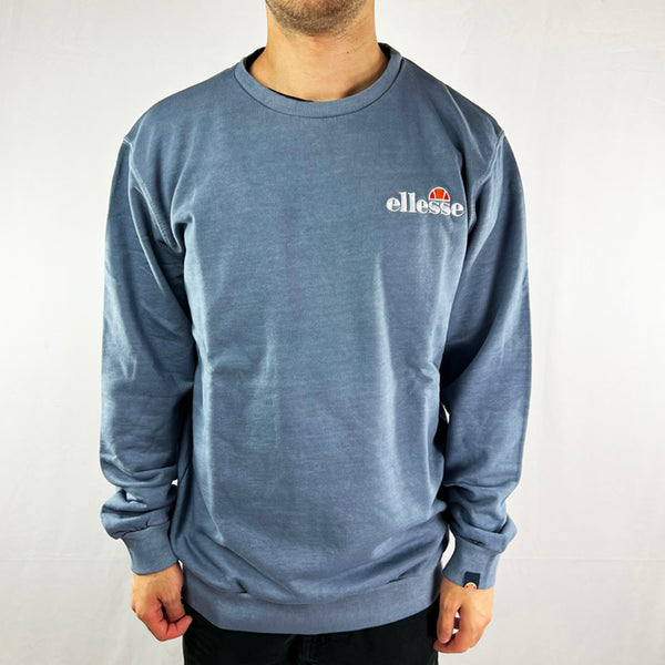 Ellesse Calendula sweatshirt in blue. Embroidered ellesse spellout to chest. Comfortable and cosy. - Materials: 100% Cotton - Size on Tag: Medium Measurements: Pit to Pit: 22.5 Inches Length: 29.5 Inches