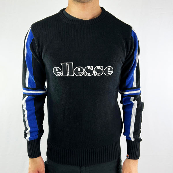 Ellesse Valessia pullover jumper in black. Embroidered ellesse spellout to chest. Comfortable and cosy sweater. - Materials: 100% Cotton - Size on Tag: Small Measurements: Pit to Pit: 19 Inches Length: 26.5 Inches