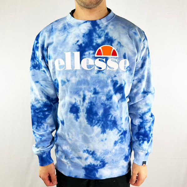 Ellesse Succiso sweatshirt in blue tie dye. Ellesse print spellout across chest. Comfortable and cosy. - Materials: 100% Cotton - Size on Tag: XS Measurements: Pit to Pit: 21 Inches Length: 28 Inches - Size on Tag: Small Measurements: Pit to Pit: 22 Inches Length: 29 Inches