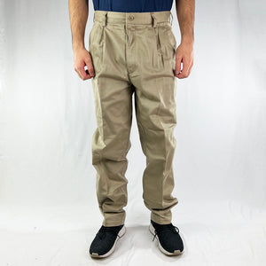 Y2K Deadstock Vintage Nike Golf trousers in beige with Nike Golf branding. Pockets to sides. Belt loops for waist adjustment. - Materials: 100% Cotton - Colour: Beige Brand New with Tags - Size on Tag: 32-32 Measurements: Inseam: 32 Inches Waist: 32 Inches