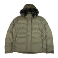 2009 Women's Deadstock Vintage Nike ACG Puffer Jacket in Khaki. Nike ACG logo to chest and swoosh to sleeve. Adjustable cord to hood. Fur on hood. Zip closure. Pockets to front. Adjustable cord to waist. 