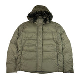 2009 Women's Deadstock Vintage Nike ACG Puffer Jacket in Khaki. Nike ACG logo to chest and swoosh to sleeve. Adjustable cord to hood. Fur on hood. Zip closure. Pockets to front. Adjustable cord to waist. 