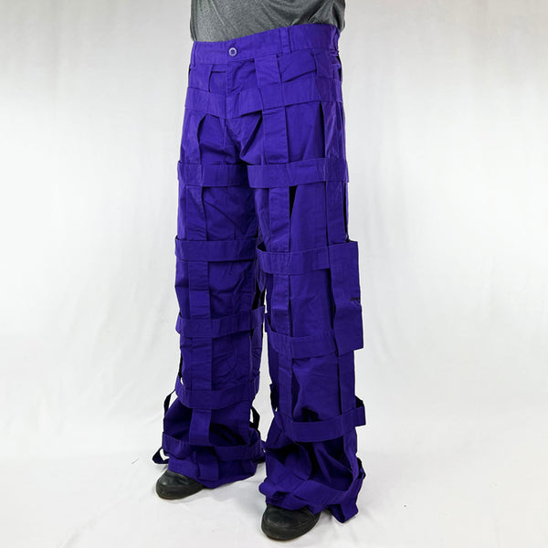 Deadstock Vintage Criminal Damage Lattice Cargo Trousers in purple with Criminal Damage branding. High-waisted trousers. Pockets to sides. Belt loops for belt adjustment. Punk rave vibes. Materials: Polyester/Cotton Condition: Brand new with tags