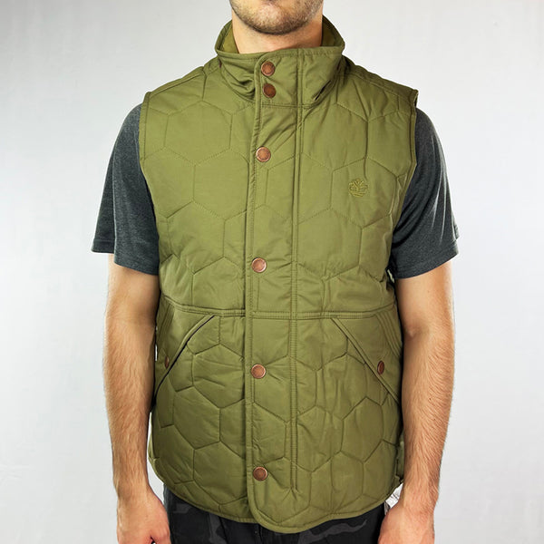 Deadstock Timberland Earthkeepers gilet waistcoat jacket in khaki green. Embroidered Timberland logo to chest.  Button pockets to front on both sides. Button and full zip closure. Inner pocket. - Colour: Khaki Green Brand New with Tags