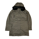 2008 Women's Deadstock Vintage Nike ACG Trench Coat in Brown. Nike ACG logo to chest. Zip closure to jacket. Zip pocket to chest. Pockets to front. Removeable fur to hood. Removeable hood. Inner media compartment. Nike Fit technology. Light insulation thermore technology. Adjustable cord to wrist. Adjustable cord to waist.