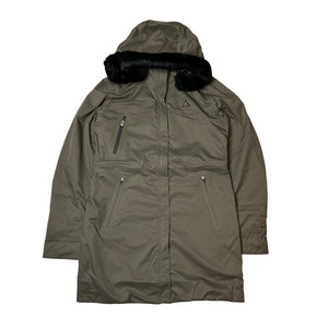 2008 Women's Deadstock Vintage Nike ACG Trench Coat in Brown. Nike ACG logo to chest. Zip closure to jacket. Zip pocket to chest. Pockets to front. Removeable fur to hood. Removeable hood. Inner media compartment. Nike Fit technology. Light insulation thermore technology. Adjustable cord to wrist. Adjustable cord to waist.
