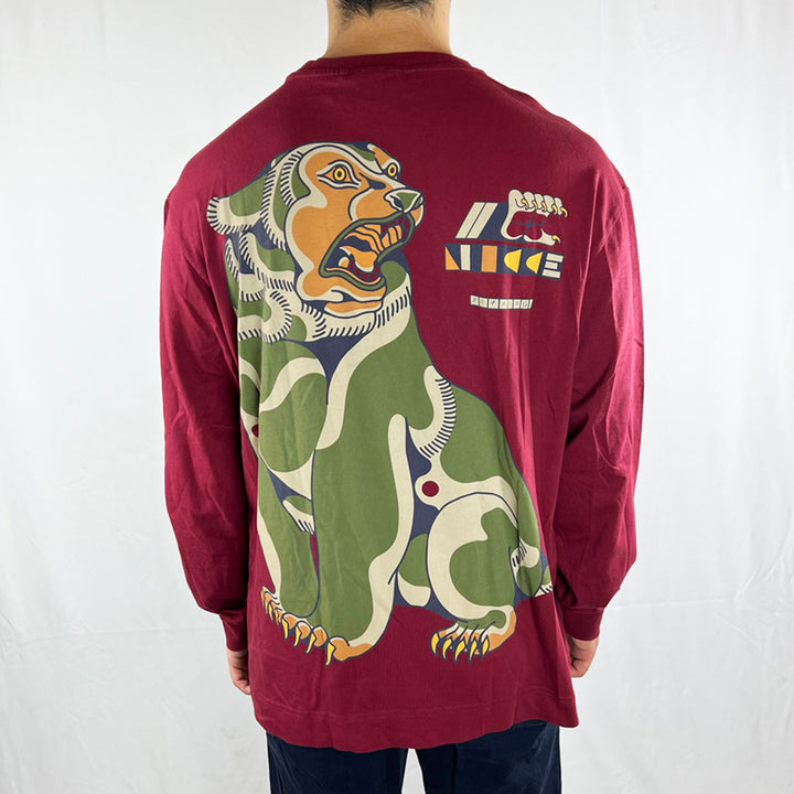 Deadstock NICCE x Boy Kong Grizzly long sleeve t-shirt in burgundy with print spellout across chest with grizzly claws. Graphic grizzly print to back. Crew neck. - Materials: Cotton - Colour: Burgundy Brand New with Tags - Size on Tag: Medium Measurements: Pit to Pit: 22 Inches Length: 28 Inches